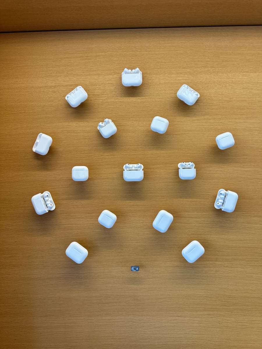 AirPods charging cases arranged on the store table