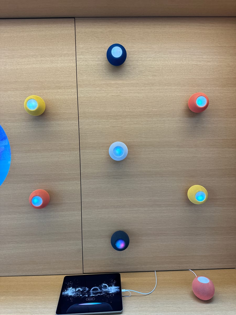 The full HomePod mini colour range: Blue, Yellow, Orange, White and Midnight