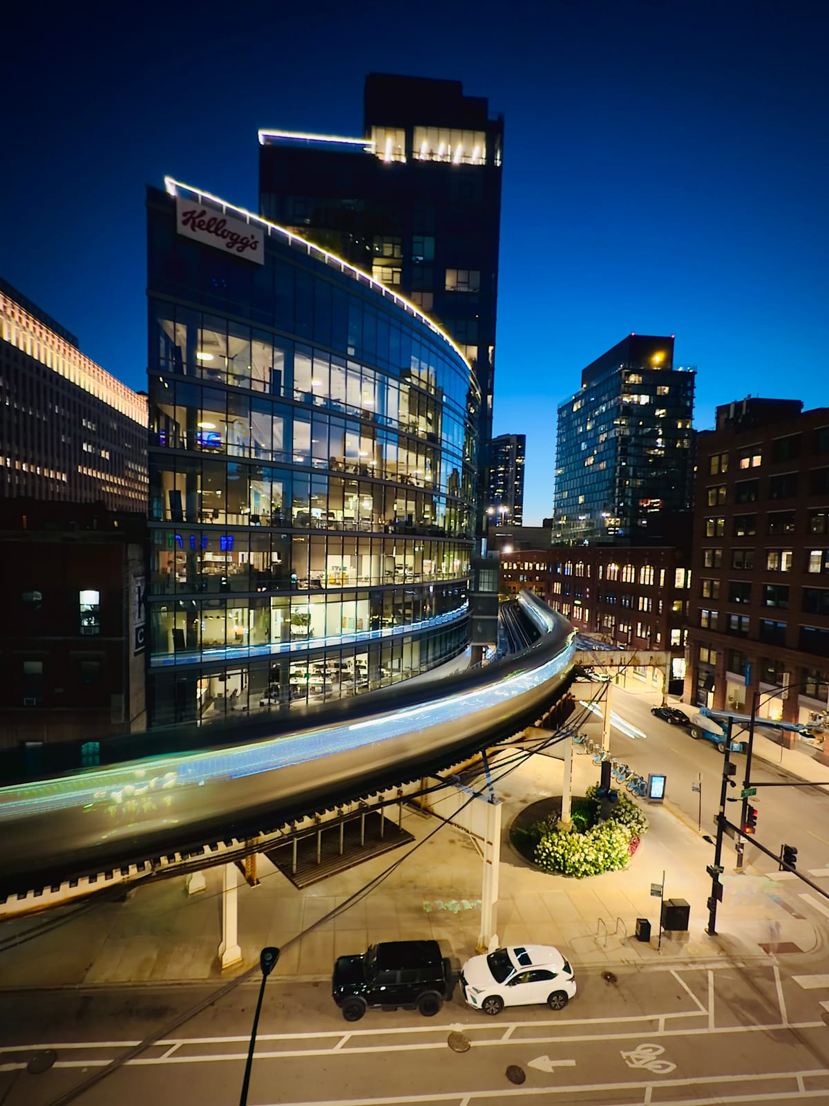 An L train streaks past the Kellogg’s building just after sunset.