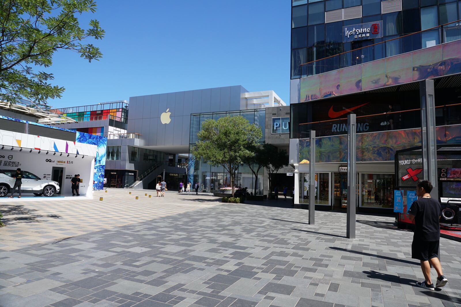 The storefront in the Sanlitun shopping district, Nike and the crowds alongside.