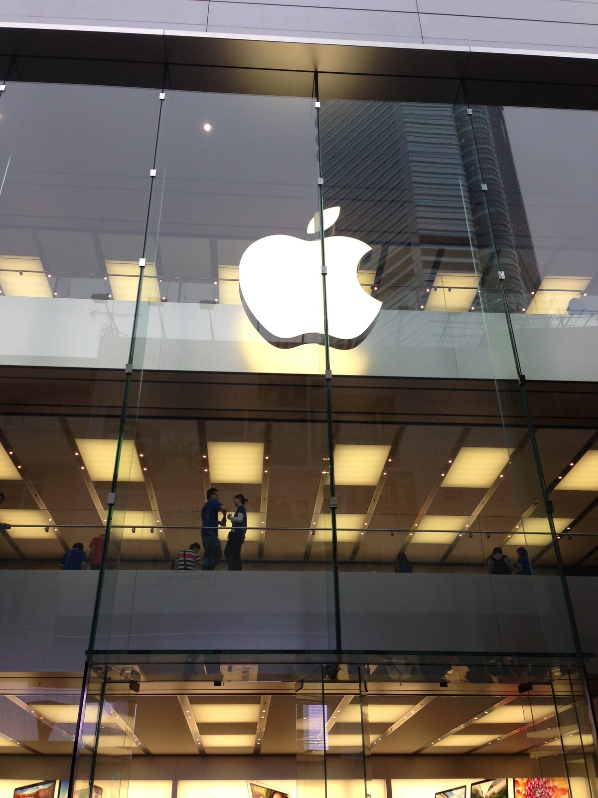 The glass facade lit up on Hennessy Road.