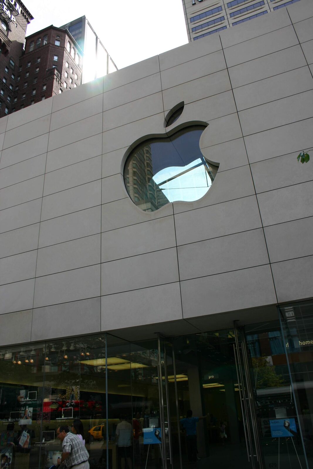 The stone facade in 2004, logo cut through to the atrium behind.